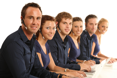 people in a call center helping customers